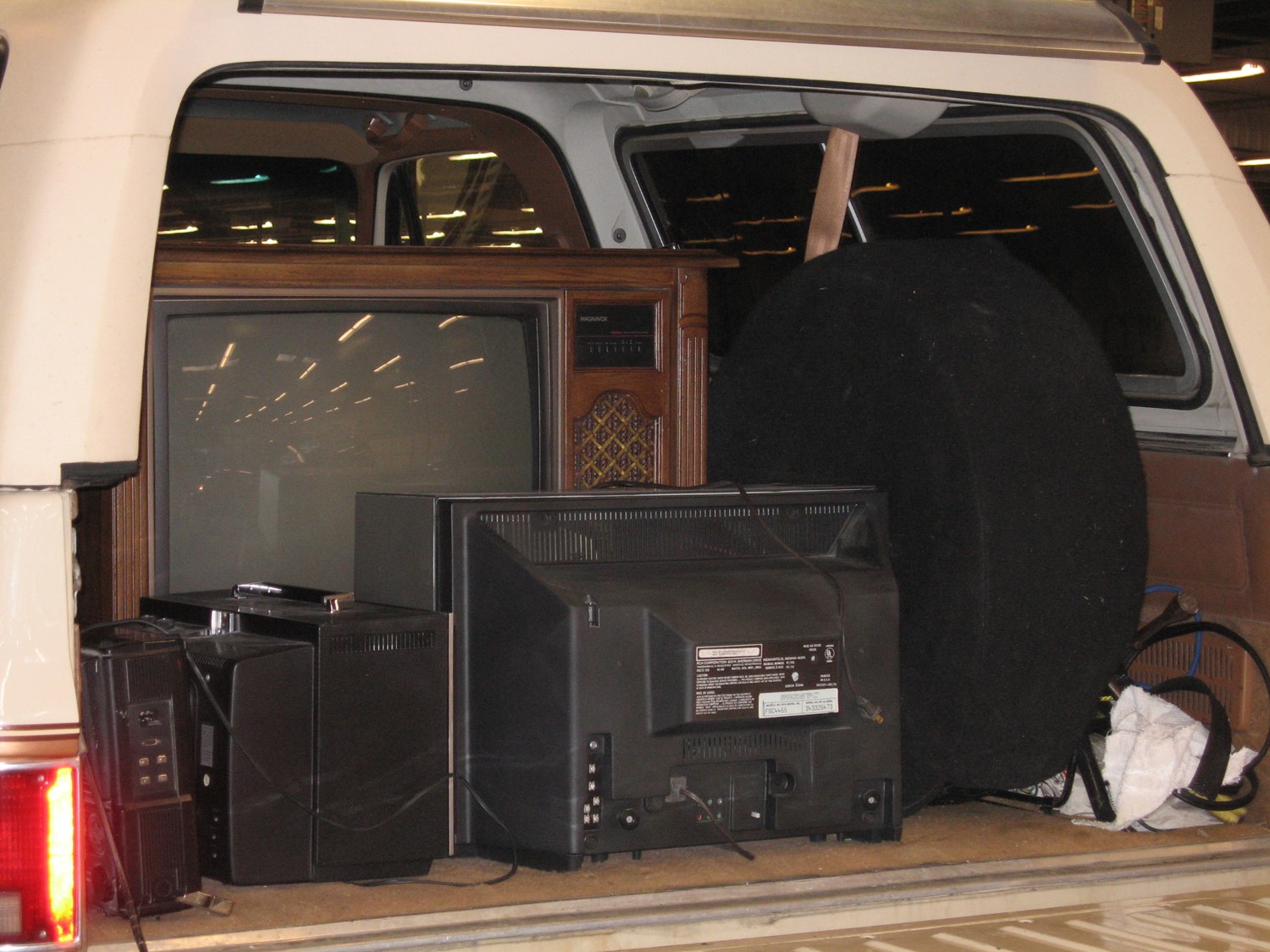 Pickup truck with electronic waste packed in the back
